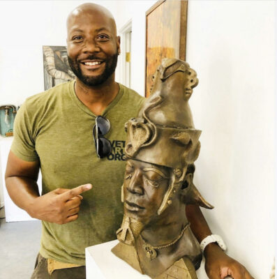 Reggie with sculpture